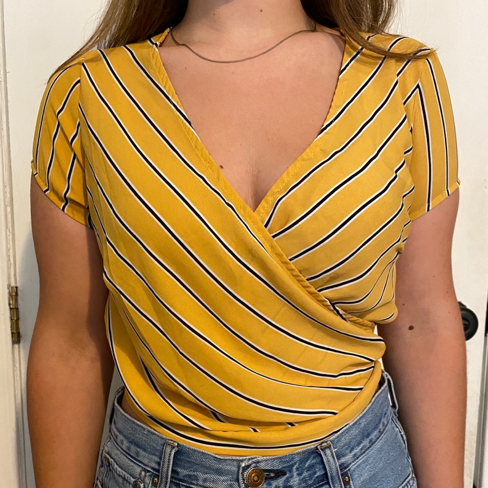 Size small black white and yellow striped wrap top